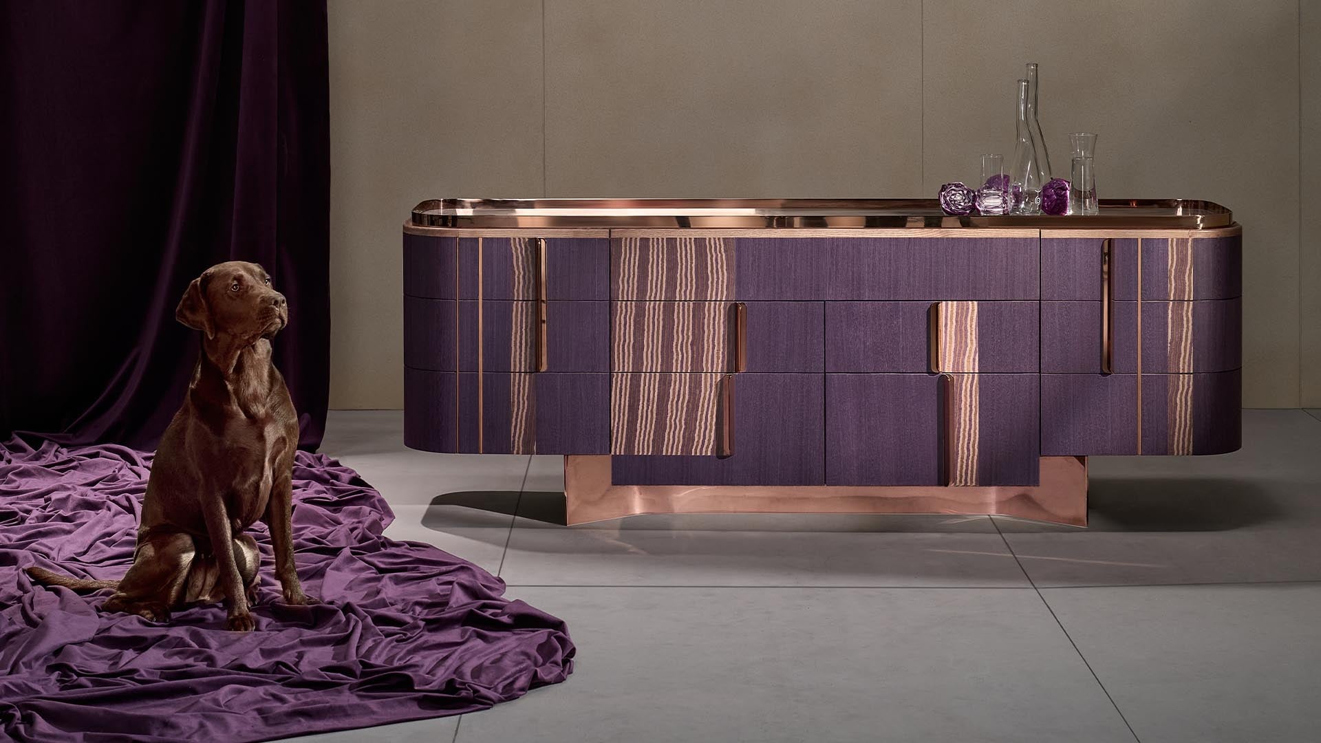 Rua dining storage from Magari's IVAI Collection in a stylish home setting, framed by deep mauve curtains and showcasing its marble top and rose gold accents.